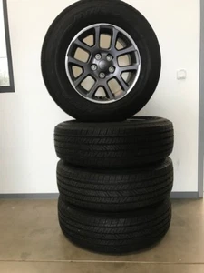 Jeep Wrangler Komplettradsatz 18" Bridgestone Dueler 255/70 R12 113T 18x7,5J - Bild 1 von 13