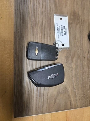 Lot of 2 Used Chevy Smart Keys.  Keys are cut. - Image 1 of 2