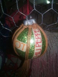 Glittery green garden ornament with light brown macrame cover - Picture 1 of 5