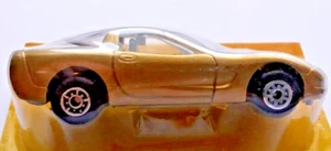 Chevy C5 Corvette RARE Gold 1:64 Scale Die Cast Vette New on a Cut Card, Maisto - Bild 1 von 4