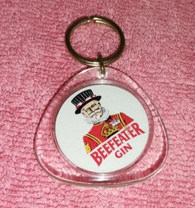 Llavero Metal/Plástico BEEFEATER GINEBRA - UN CENTAVO 1967 - Imagen 1 de 4
