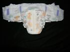 2 modified Huggies little movers size 7 35 Lbs with double tabs 