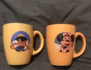 Disneyland Paris Pinocchio/Minnie Mouse Yellow & Blue ESSO Mug.275ml. - Picture 1 of 9