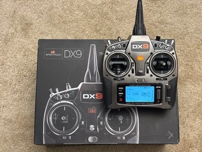 Transmisor Spektrum DX9 2,4 GHz 9 canales con cargador y batería (excelente estado) Foto 1 de 4