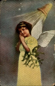 Tarjeta postal de felicitación noruega niña en vestido amarillo alas de ángel c1910 - Imagen 1 de 2