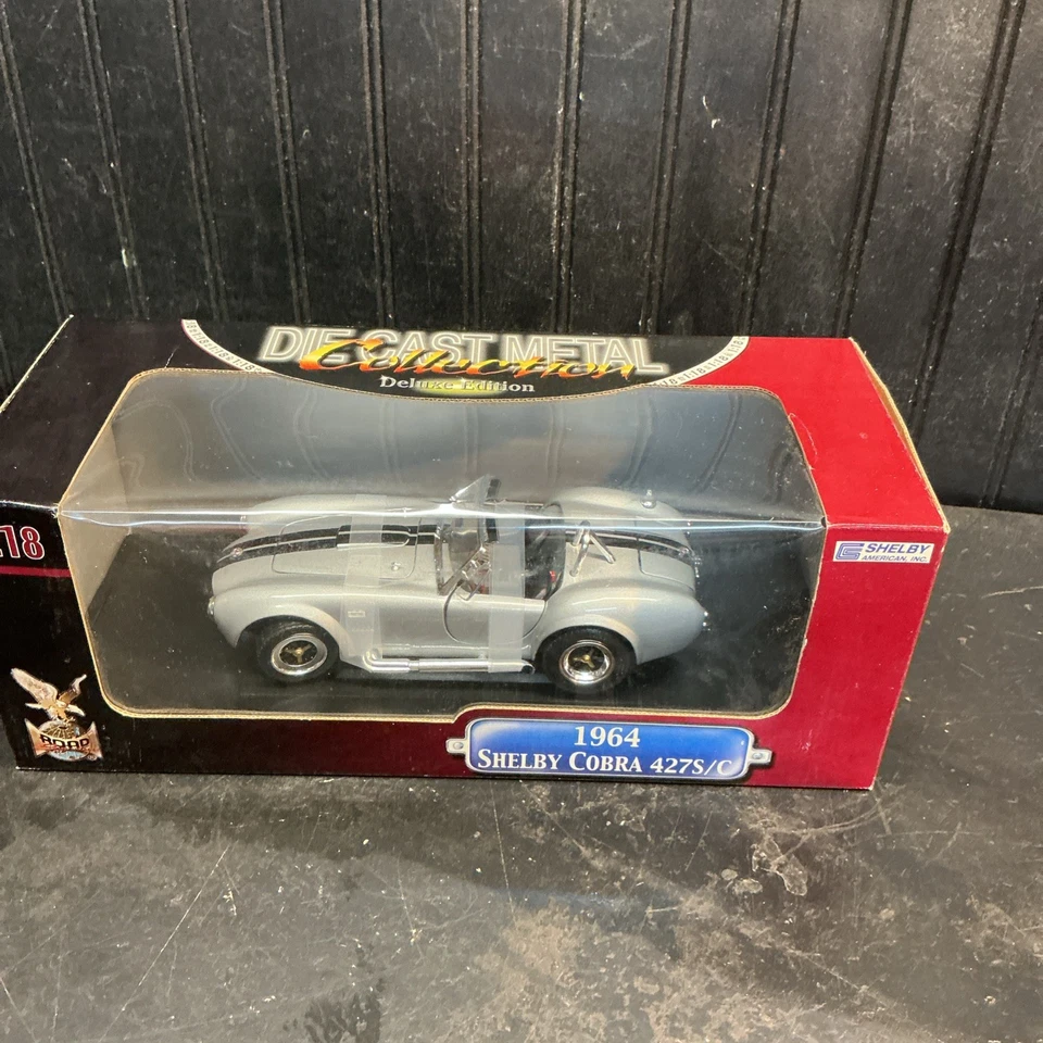 Shelby Cobra 427 1964 S/C - escala 1:18 Die Cast Metal Deluxe caja sin abrir Foto 1 de 3