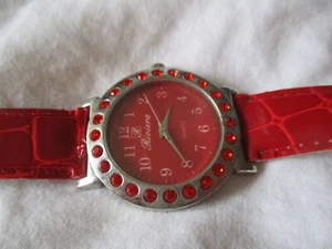Riviera Wristwatch Red Buckle Band Round Face Silver Toned - Picture 1 of 12
