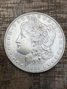 1885 $1 US Morgan Silver Dollar - Picture 1 of 2