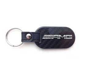 Llavero AMG plateado logotipo Mercedes Benz fibra de carbono - 2x2 brillo oblongo - Imagen 1 de 3