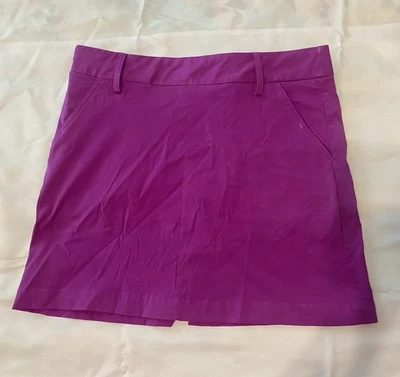 Falda deportiva de golf PUMA magenta para mujer con bolsillos cortos cremallera lateral talla 10 LINDA Foto 1 de 4