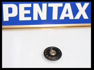 208680 PENTAX SUPERPROGRAMM ASA ISO DIAL REPARATURTEIL GEBRAUCHT - Bild 1 von 2