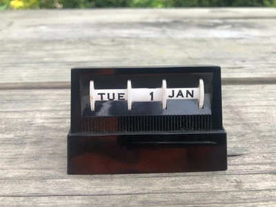 Calendario perpetuo baquelita vintage negro Foto 1 de 4