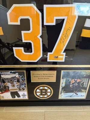 Framed Autographed/Signed Patrice Bergeron 33x42 Boston Black Jersey PSA/DNA COA - Image 1 of 3