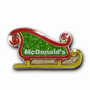 Spilla McDonald’s slitta Babbo Natale glitter 2009 verde, rosso e giallo spilla da bavero in metallo - Foto 1 di 4