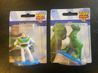 Disney Toy Story 4-(2) Mini Figuras Juguetes Buzz y Dino...nuevo Foto 1 de 2