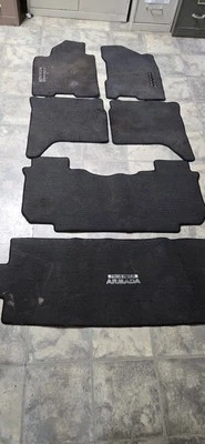 04 Juego de alfombrillas de fábrica Nissan Pathfinder Armada Foto 1 de 4