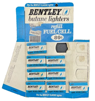 Cartucho de recarga encendedor de butano Bentley vintage pila de combustible exhibición de tienda Foto 1 de 4