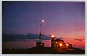Postal El faro al atardecer de noche - Imagen 1 de 2