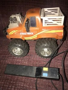 Vintage 1980’s Orange 4x4 Stake Truck Wired Remote Stomper - Picture 1 of 6