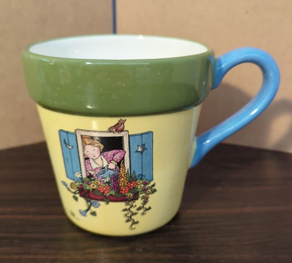 Taza de café Teleflora Mary Engelbreit, caja ventana flores riego, 1999 Foto 1 de 4
