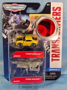 Micro Máquinas Transformers Bumblebee & Megatron Paquete de 2 Nuevo - Imagen 1 de 3