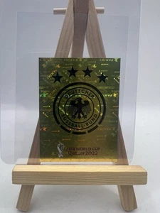2022 Panini FIFA World Cup Qatar Stickers Gold Germany Team Logo #GER 2 - Picture 1 of 17
