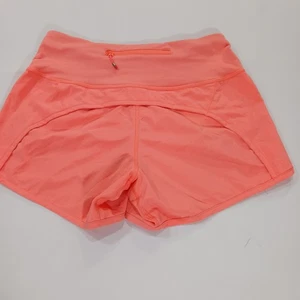 Lululemon Damen Pfirsich Laufen Sport Shorts mit Reißverschlusstasche Größe 2 (26×4) - Bild 1 von 14