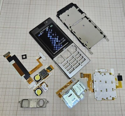 Cubierta 100% Original SonyEricsson T700 Piezas MEZCLA Negro/Plateado NUEVO Foto 1 de 2