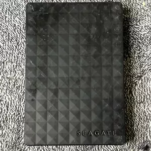 Disco duro externo portátil Seagate de 2 TB HDD SIN cable – SIN PROBAR - Imagen 1 de 3