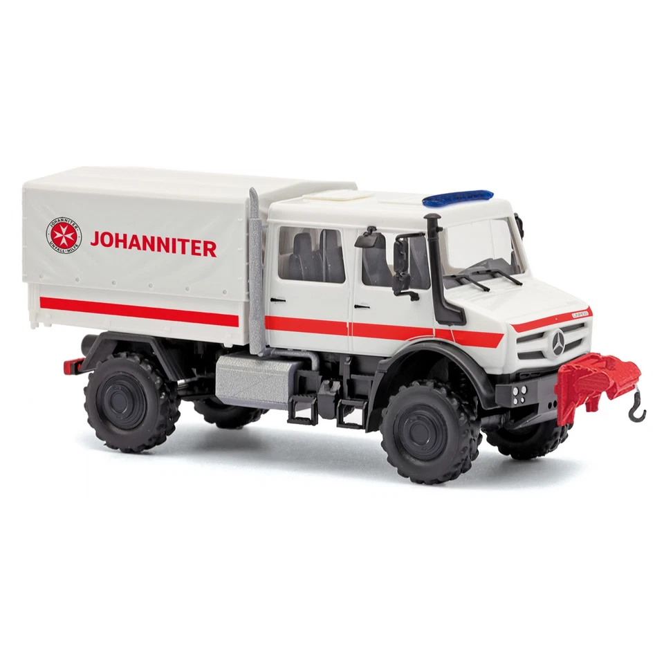 Busch 51084 Mercedes-Benz Unimog U 5023 Cabina Doppia, Johanniter, H0, Neu 2025 - Immagine 1 di 1