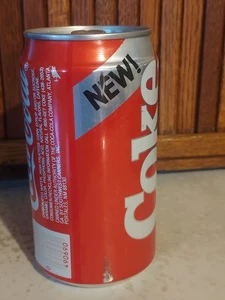Nueva lata de aluminio Coca Cola original vintage años 80 sellada casi vacía  - Imagen 1 de 12