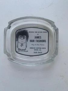 Cenicero de vidrio James Hair Fashions pelucas y piezas para el cabello Brookside Delaware de colección años 70 - Imagen 1 de 1