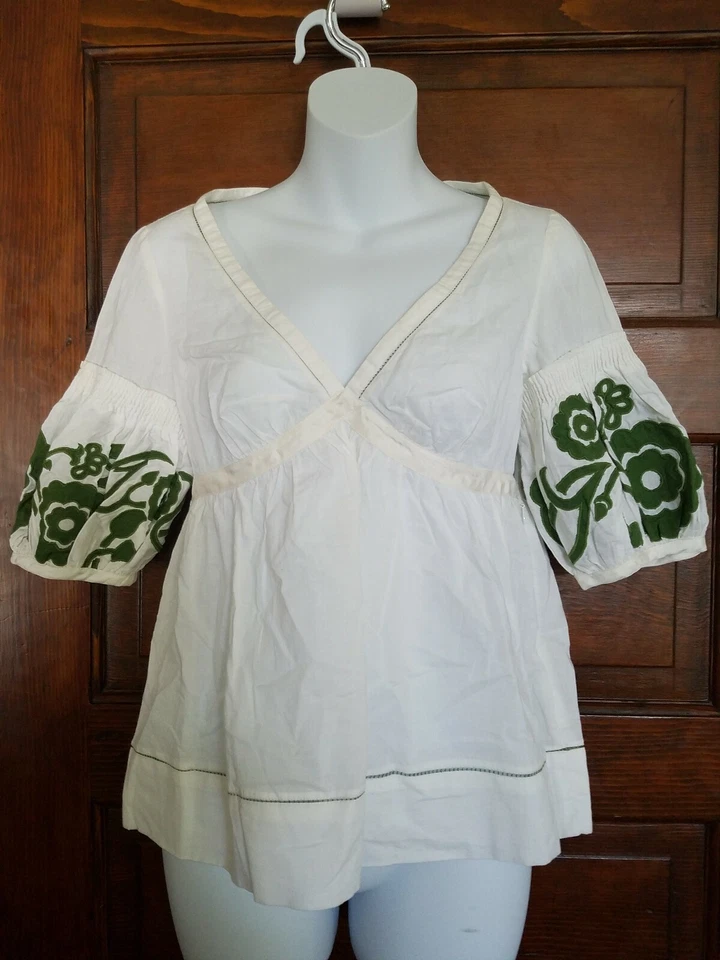 NUEVO CON ETIQUETAS BLUSA ANTHROPOLOGIE LITHE BLANCA CON APLIQUES FLORALES TALLA 0 Foto 1 de 3