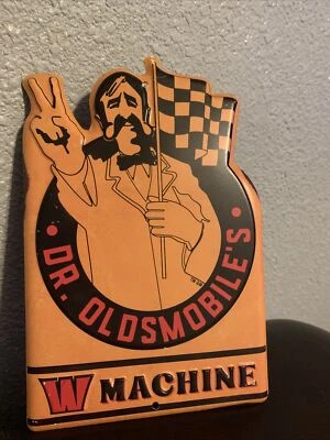 DR. OLDSMOBILE'S W MACHINE Embossed Tin Sign 4 b - Image 1 of 4