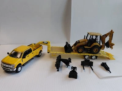1/64 2019 Ford F350 Dually with 5th Wheel Trailer and Cat 420 XE Backhoe Loader - Image 1 of 4