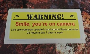 CCTV Warnaufkleber "Lächle du bist vor der Kamera" Sticker 7-10 Jahre Vinyl - Bild 1 von 1