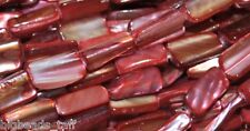 A string 16" long shell nuggets red 15mm beads