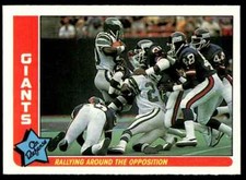 1985 Fleer Team Action Rallying Around the Opposition New York Giants #56