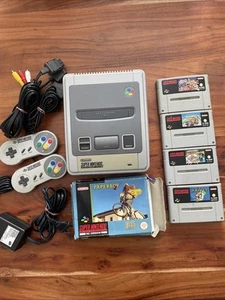 Super Nintendo Entertainment System Konsole, 2 Controller + 5 Spiele - Bild 1 von 10