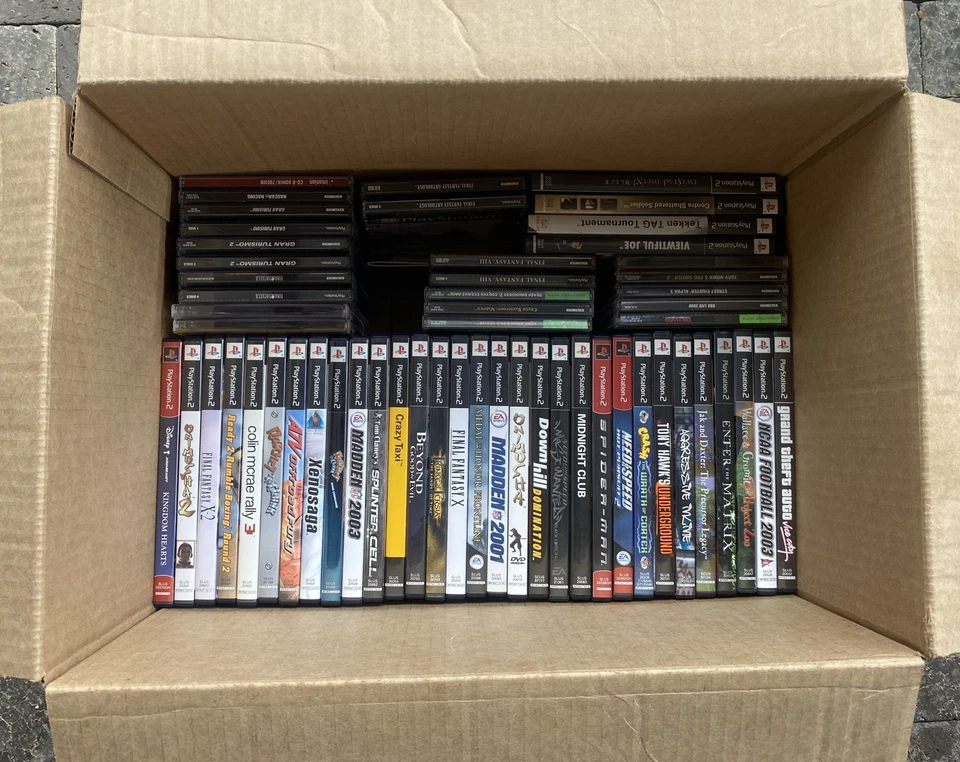 Lot of 52 Sony PlayStation 2 / PlayStation 1 Video Games CIB Tested Collectible  - Image 1 of 4