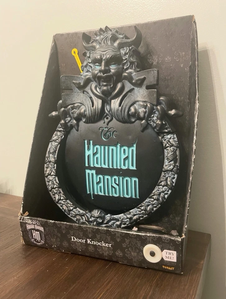 Llamador de puerta de mansión embrujada Foto 1 de 1