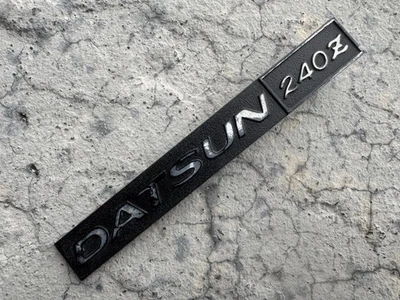 Guantera tapa emblema insignia, OE DATSUN 240Z Fairlady S30 Foto 1 de 4