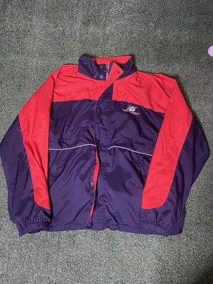 Chaqueta cortavientos New Balance vintage grande roja azul cremallera completa cuello años 90 Foto 1 de 4
