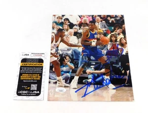 Foto firmada por Dikembe Mutombo 8 x 10 pepitas a color JSA automática - Imagen 1 de 3