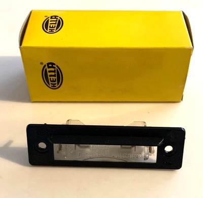 Parte de luz de matrícula Hella # 96463162001 NOS PORSCHE 928 968 911 1989-94 Foto 1 de 4