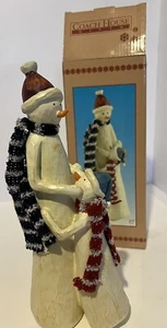 Remise Schneemann singend mit Familie - Bild 1 von 6