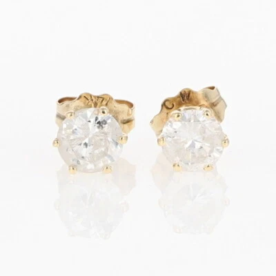 Par de aretes solitario de diamantes de corte redondo de 0,57 quilates de oro amarillo de 14 k  Foto 1 de 4