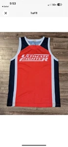 Camiseta deportiva de malla 2013 UFC TUF 17 The Ultimate Fighter Team Jones para hombre paquete L nueva - Imagen 1 de 3