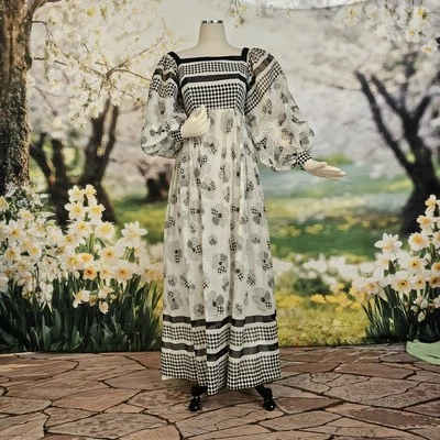 Maxi vestido vintage años 70 largo piso globo mangas abullonadas blanco y negro  Foto 1 de 4
