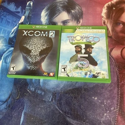 Tropico 5 Penultimate Edition And Xcom 2 Xbox One Strategy Game Lot - Image 1 of 4